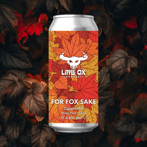 A can of Little Ox Brewery For Fox Sake Copper IPA on a background of dark autumn leaves.